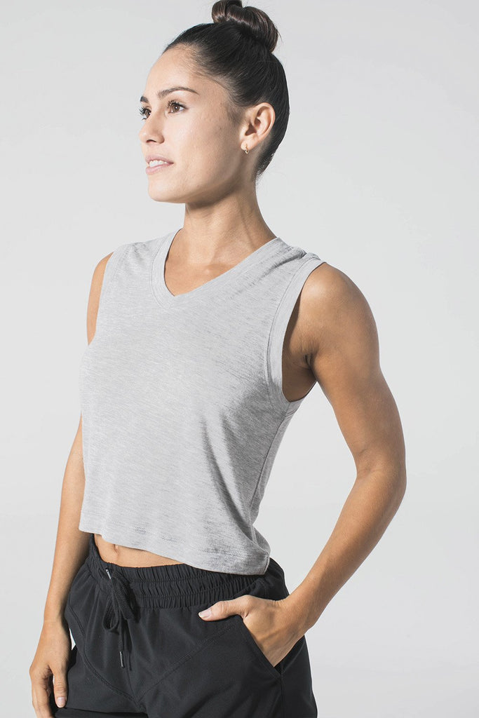 Woman is wearing 9 2 5 fit Miami Hit Grey Crop Tee