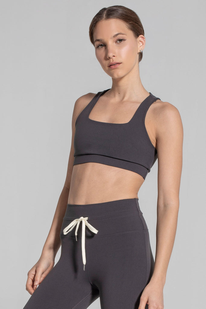 Woman is wearing 925 fit Fair & Square Slate Sports Bra.