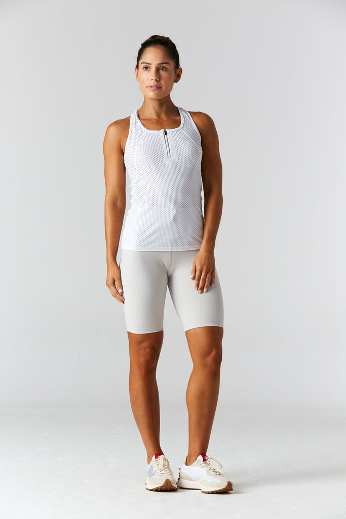 Woman is wearing 9 2 5 fit Fast Track White Racerback Tank Top