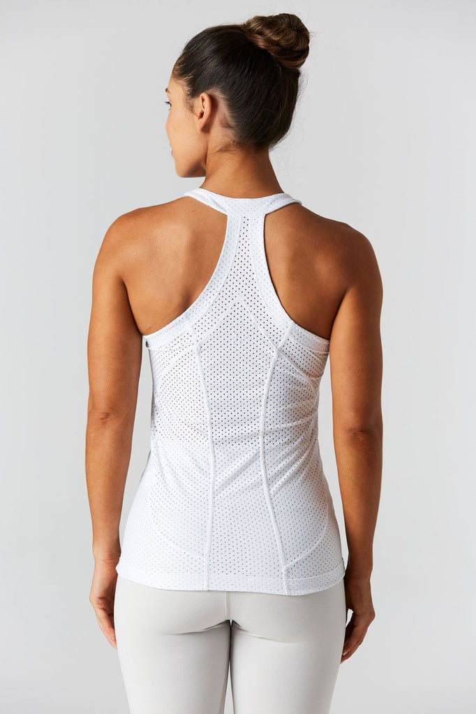 Woman is wearing 9 2 5 fit Open Minded Racerback Tank Top White Mesh