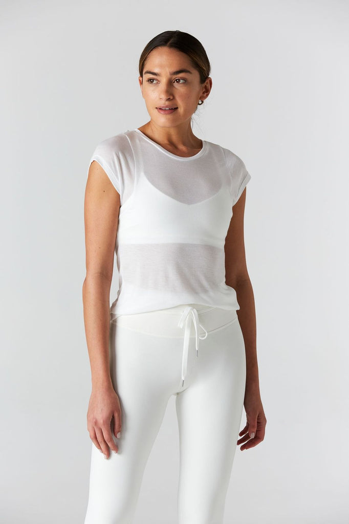 Woman is wearing 9 2 5 fit 2AT White Basic Tee