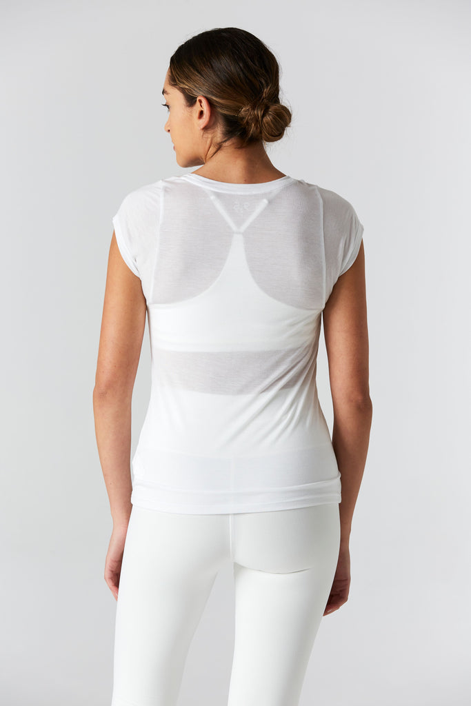 Woman is wearing 9 2 5 fit 2AT White Basic Tee