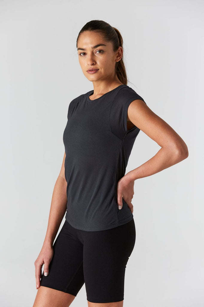 Woman is wearing 9 2 5 fit 2AT Slate Basic Tee