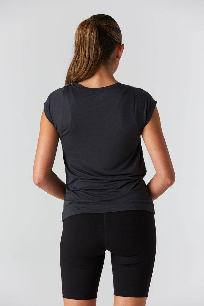 Woman is wearing 9 2 5 fit 2AT Slate Basic Tee