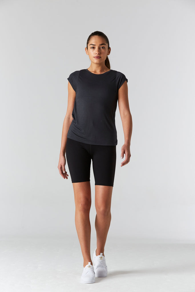Woman is wearing 9 2 5 fit 2AT Slate Basic Tee
