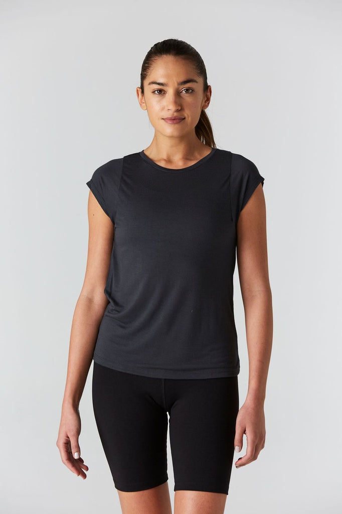 Woman is wearing 9 2 5 fit 2AT Slate Basic Tee