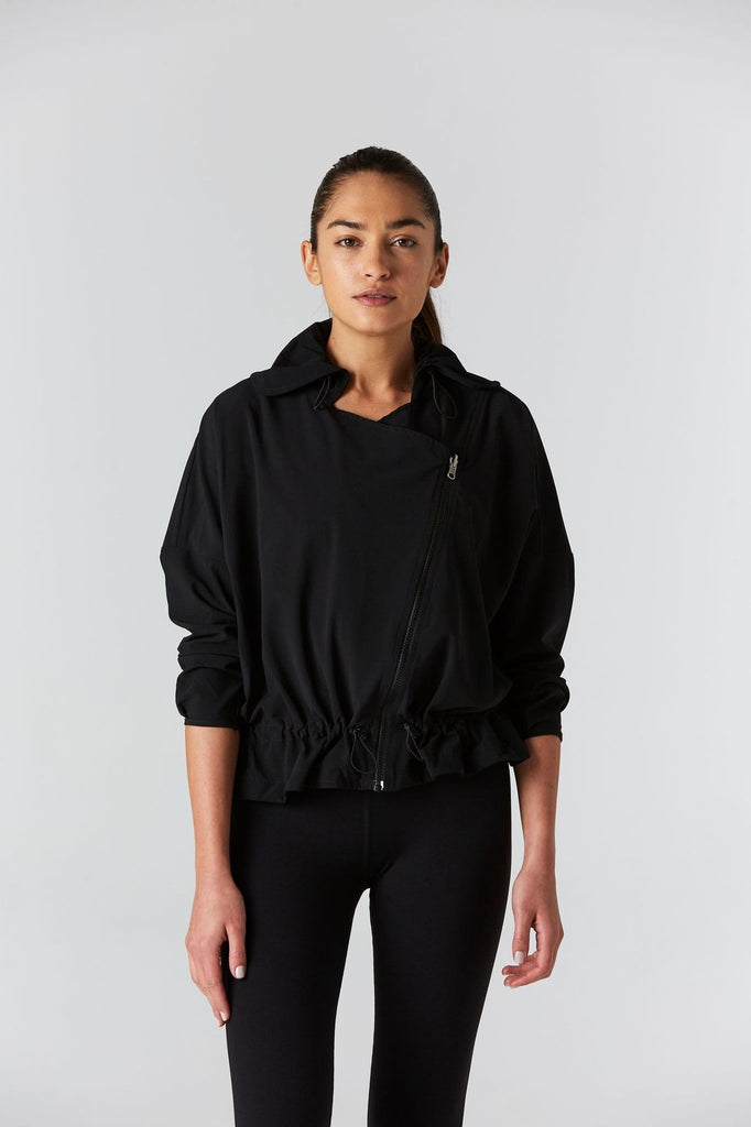 Woman is wearing 925 fit D-side black jacket.