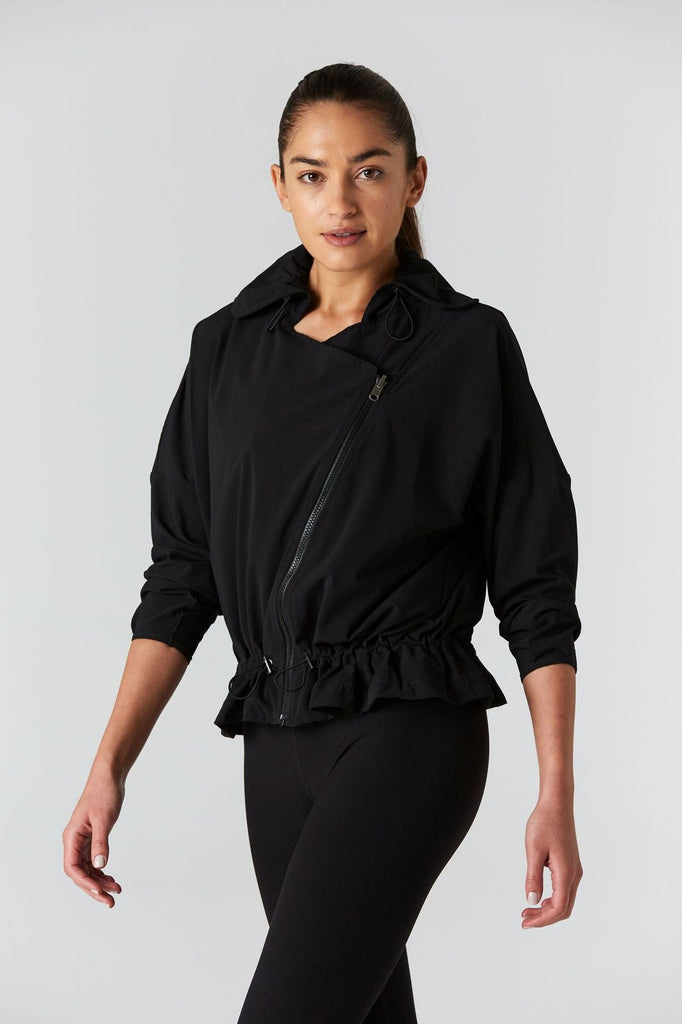 Woman is wearing 925 fit D-side black jacket.