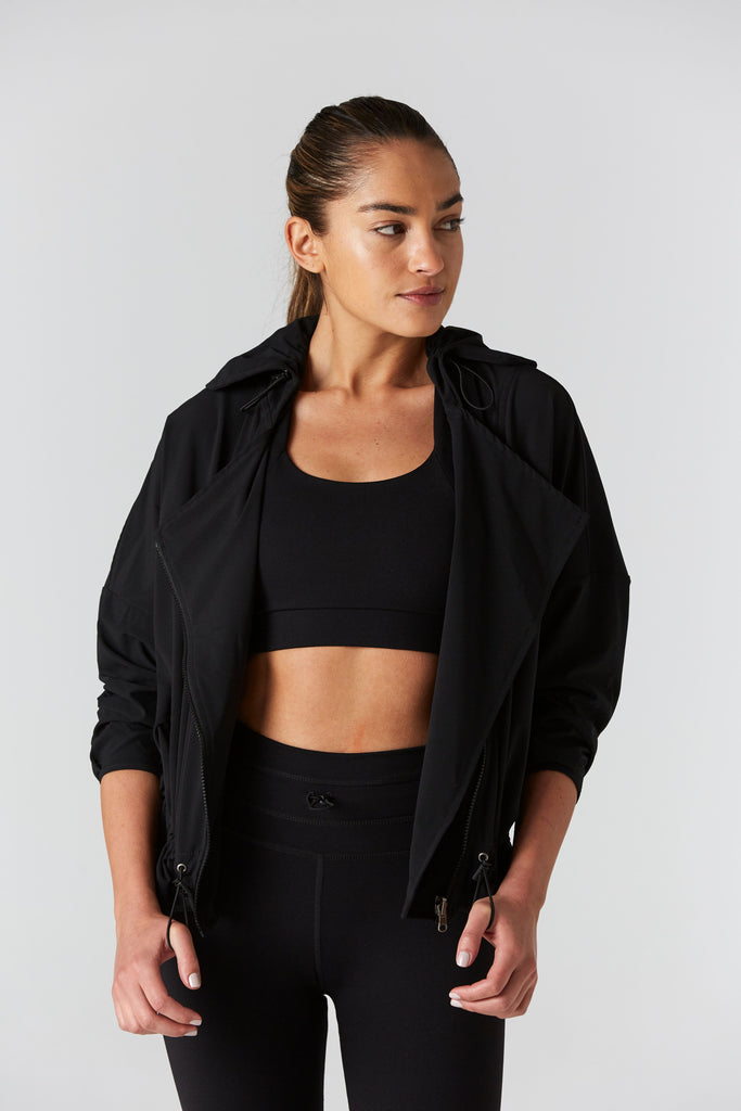 Woman is wearing 925 fit D-side black jacket.
