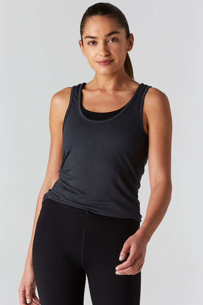 Woman is wearing 9 2 5 fit D tox T Slate Racerback Tank Top