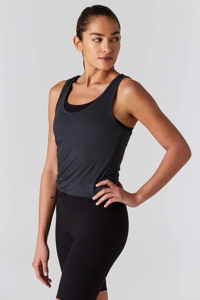 Woman is wearing 9 2 5 fit D tox T Slate Racerback Tank Top