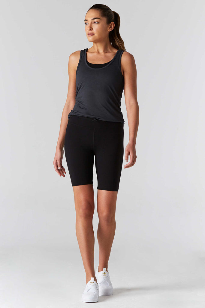 Woman is wearing 9 2 5 fit D tox T Slate Racerback Tank Top