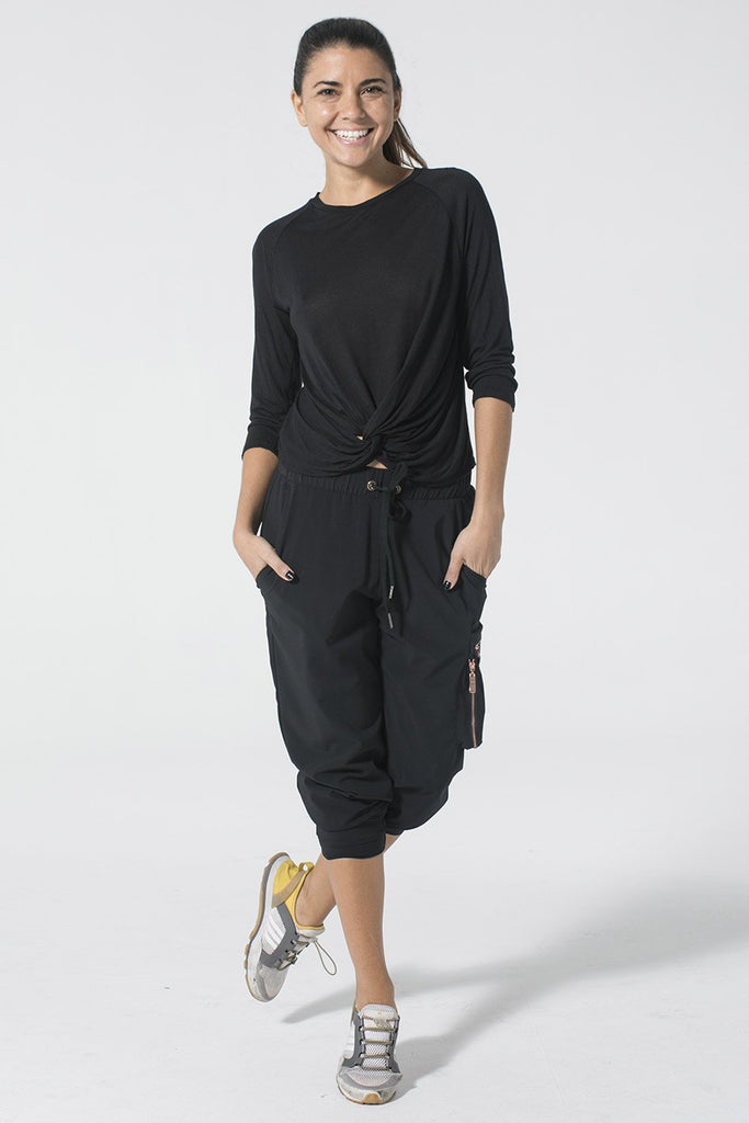 Woman is wearing 9 2 5 fit Do's & Don'ts Black 3/4 length Top
