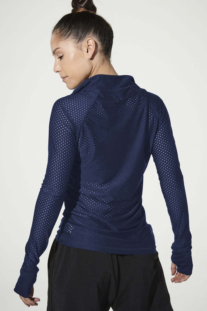 Woman is wearing 9 2 5 fit Zip & Slide Navy Long Sleeve Top