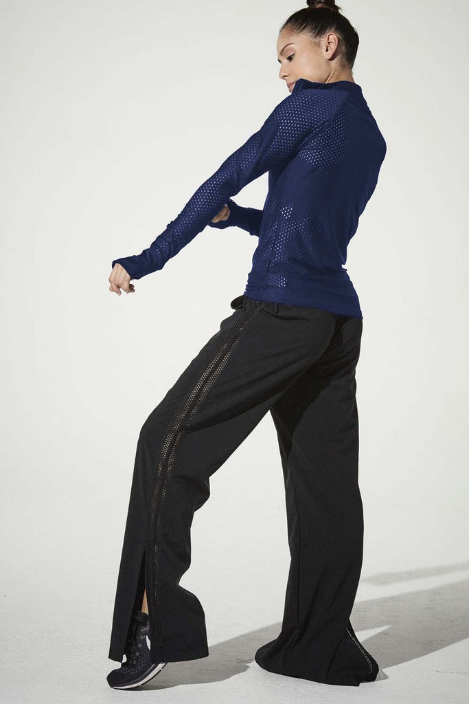 Woman is wearing 9 2 5 fit Zip & Slide Navy Long Sleeve Top