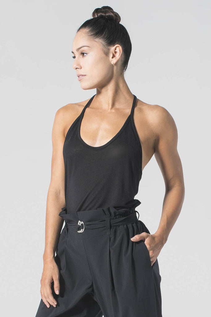 Woman is wearing 9 2 5 fit Fine Line Black Racerback Tank Top