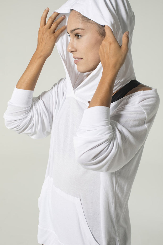 Woman is wearing 9 2 5 fit From the Hoodie White Top