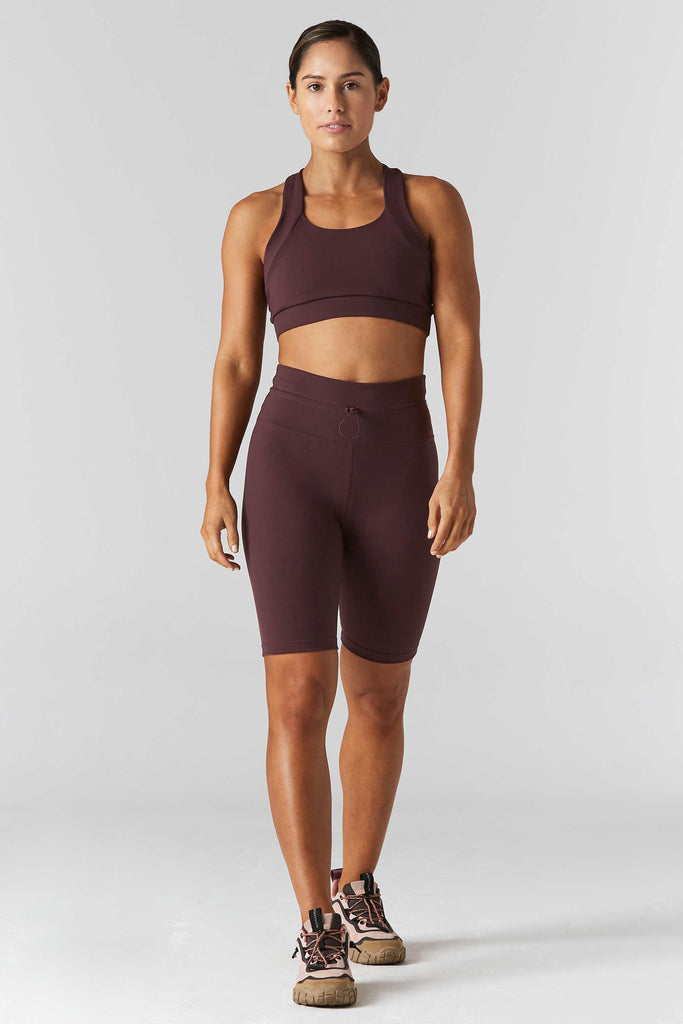 Woman is wearing 925 fit Multi task fig sports bra